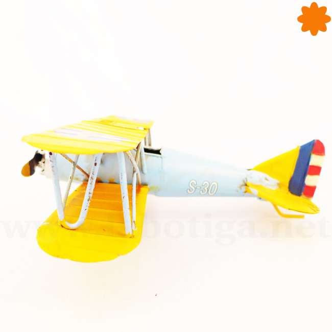 avi_n_peque_o_de_metal_color_azul_cielo_y_amarillo